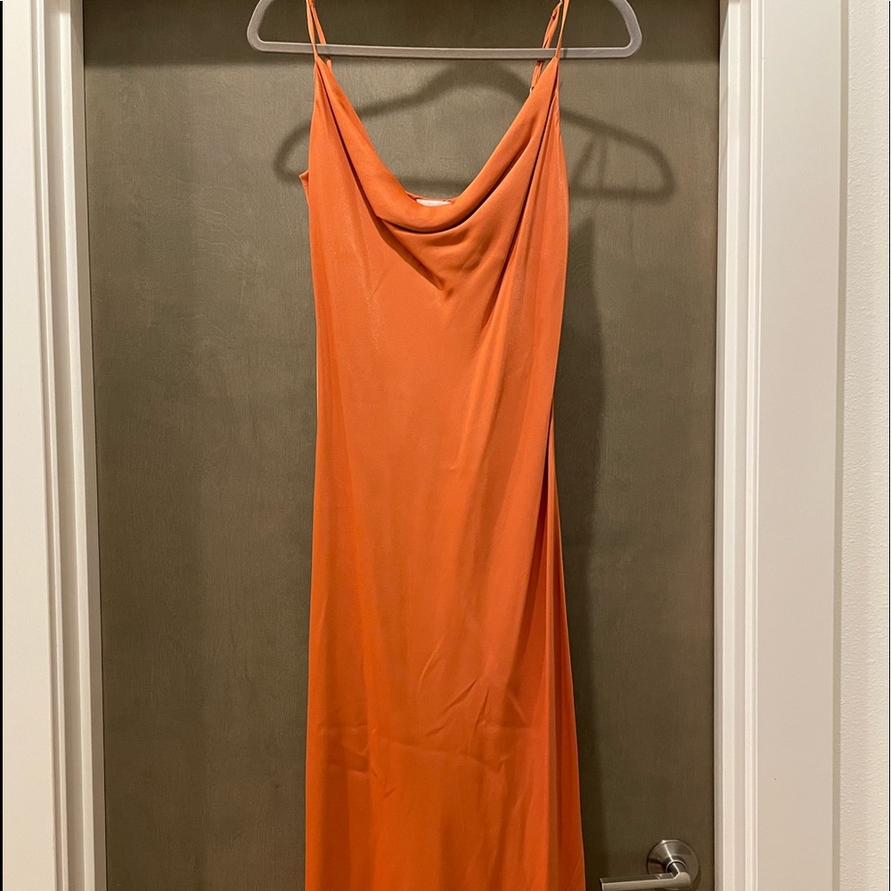 Knee length dress.